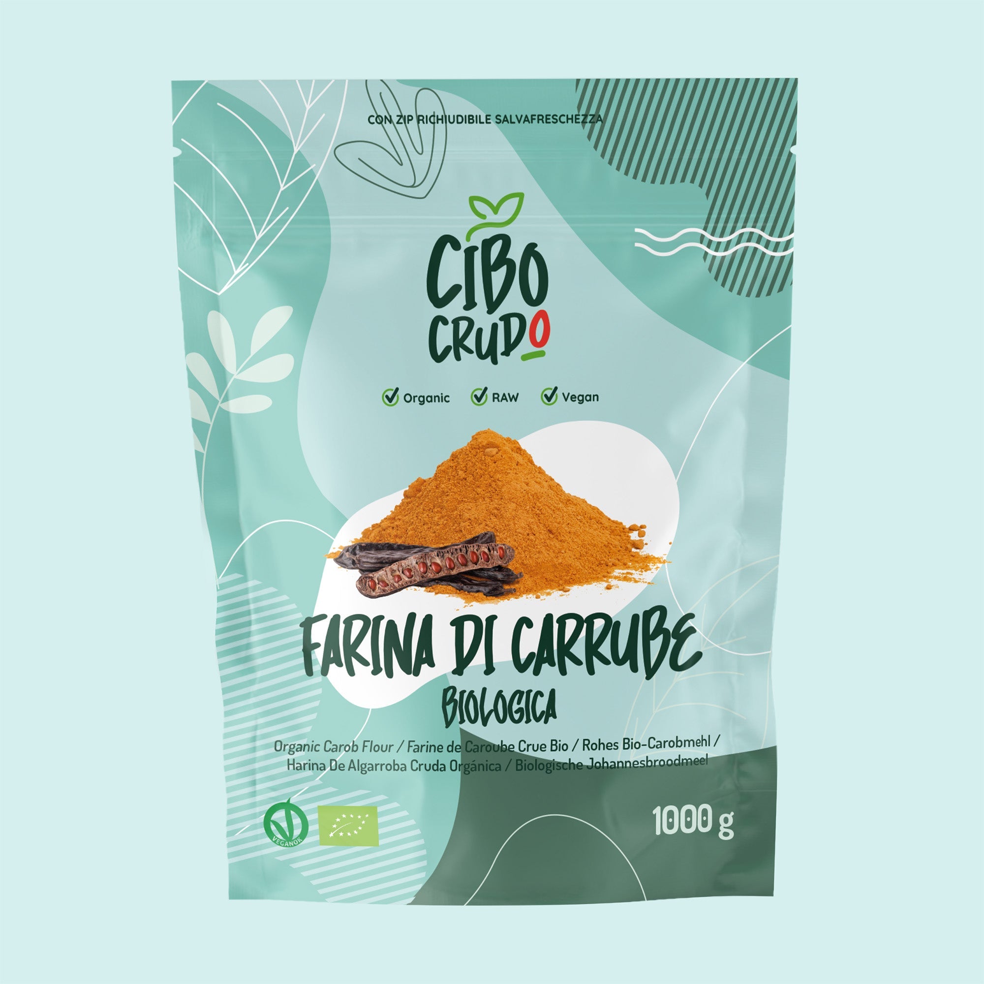 Farina di carrube biologica Cibo Crudo, busta richiudibile da 1000 g con baccelli e cumulo di polvere